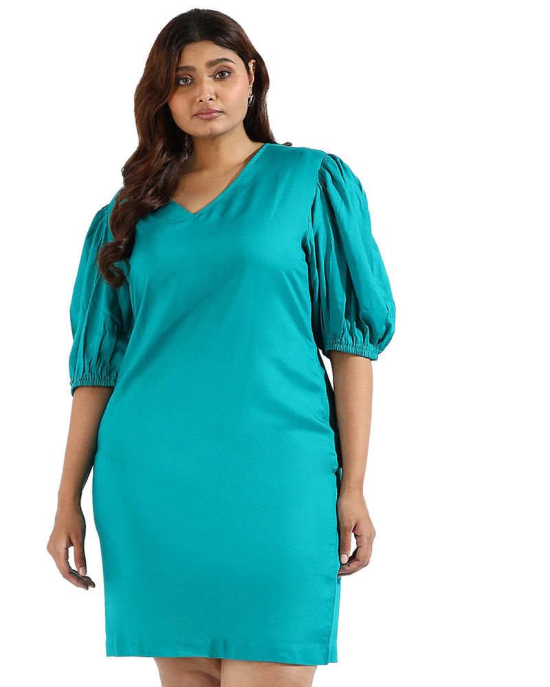 Front of a model wearing a size 3XL Solid Teal A-Line Dress in Teal by Instafab Plus. | dia_product_style_image_id:297939